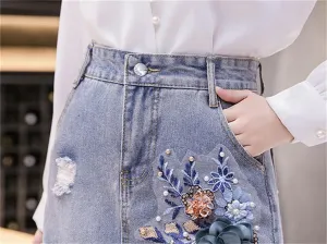 Women's Embroidered Denim Skirt Ripped High Waisted Irregular Hem Tassels Mini Skirts